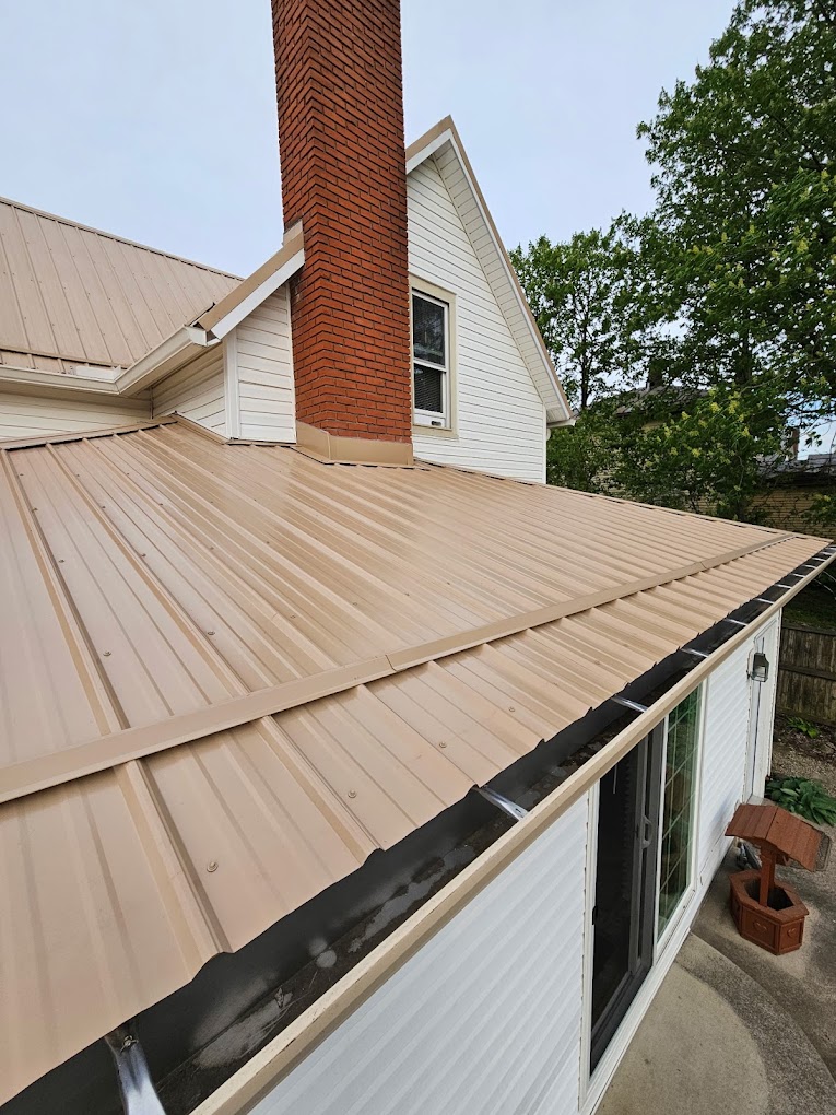 Shield Pro Roofing rep meeting an insurance adjuster on a damaged roof in Licking County