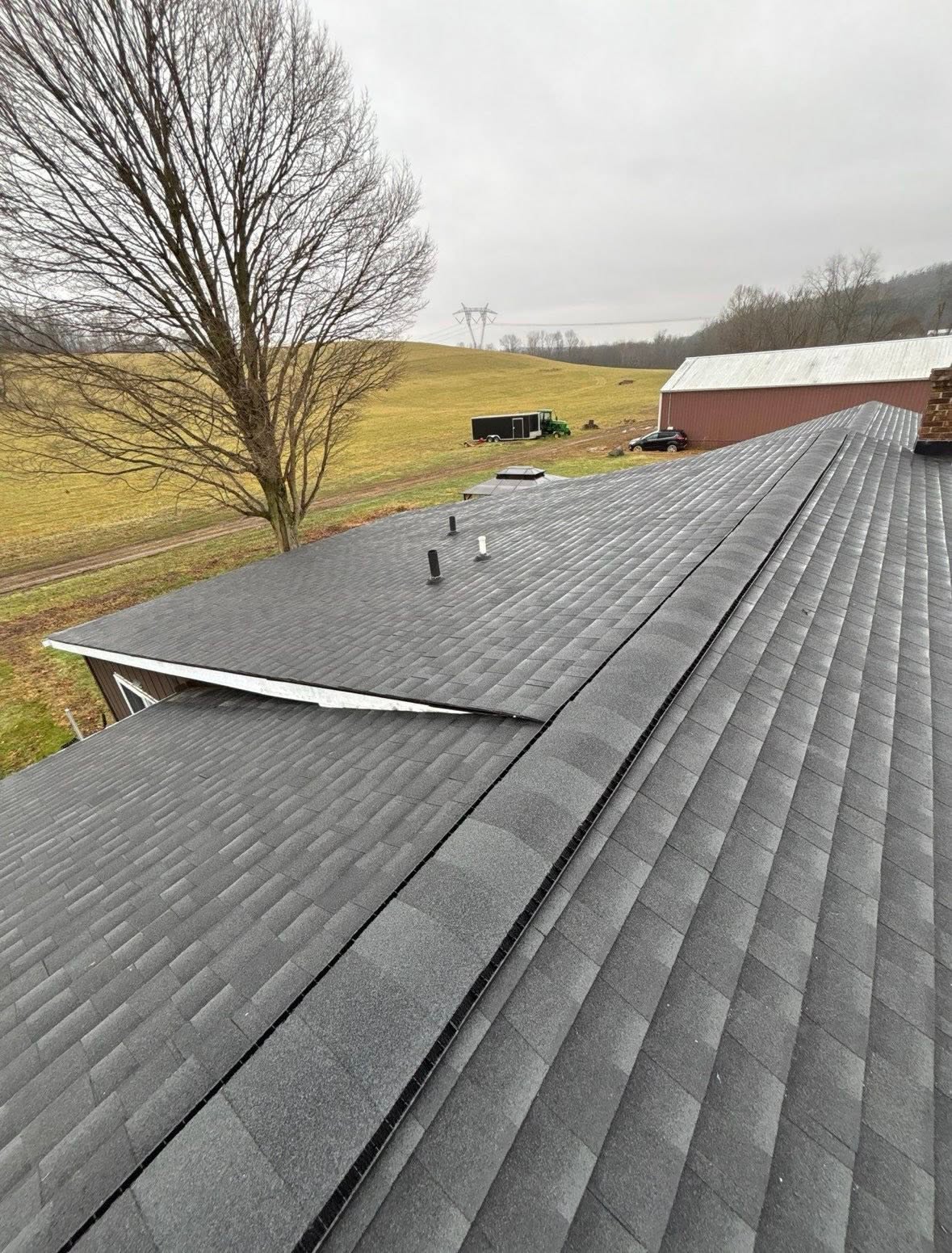 Newly completed architectural shingle roof in Newark, Ohio